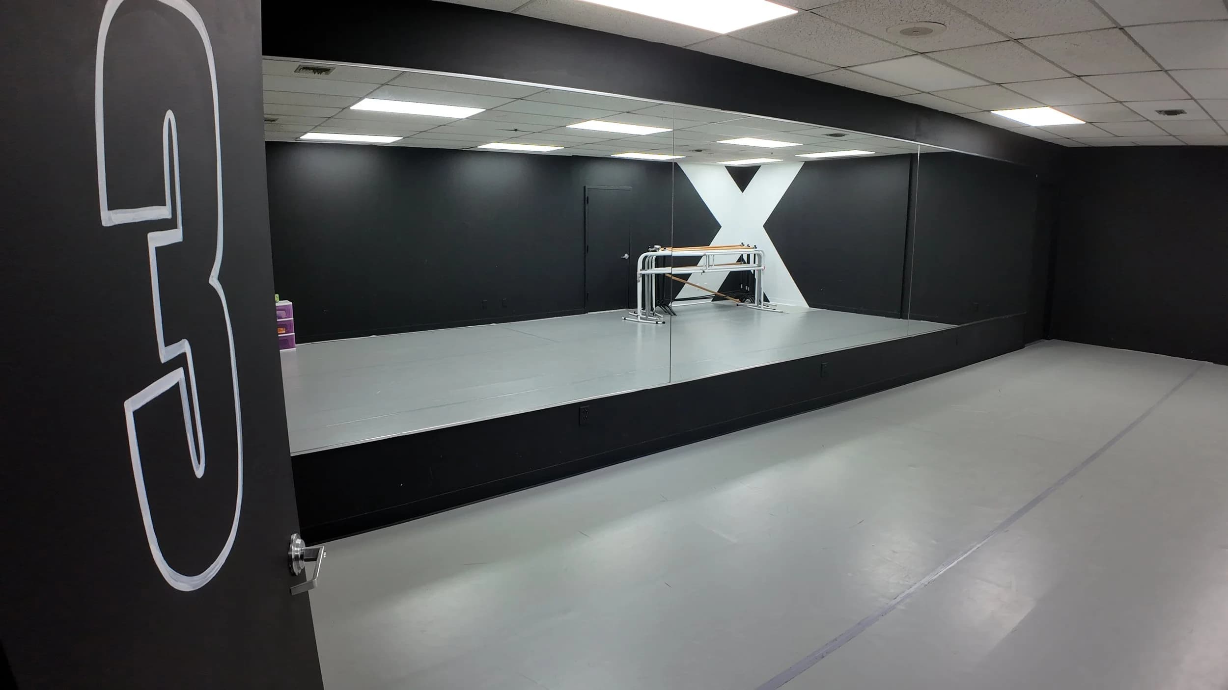 DXNY ballet studio with barres and full-length mirrors