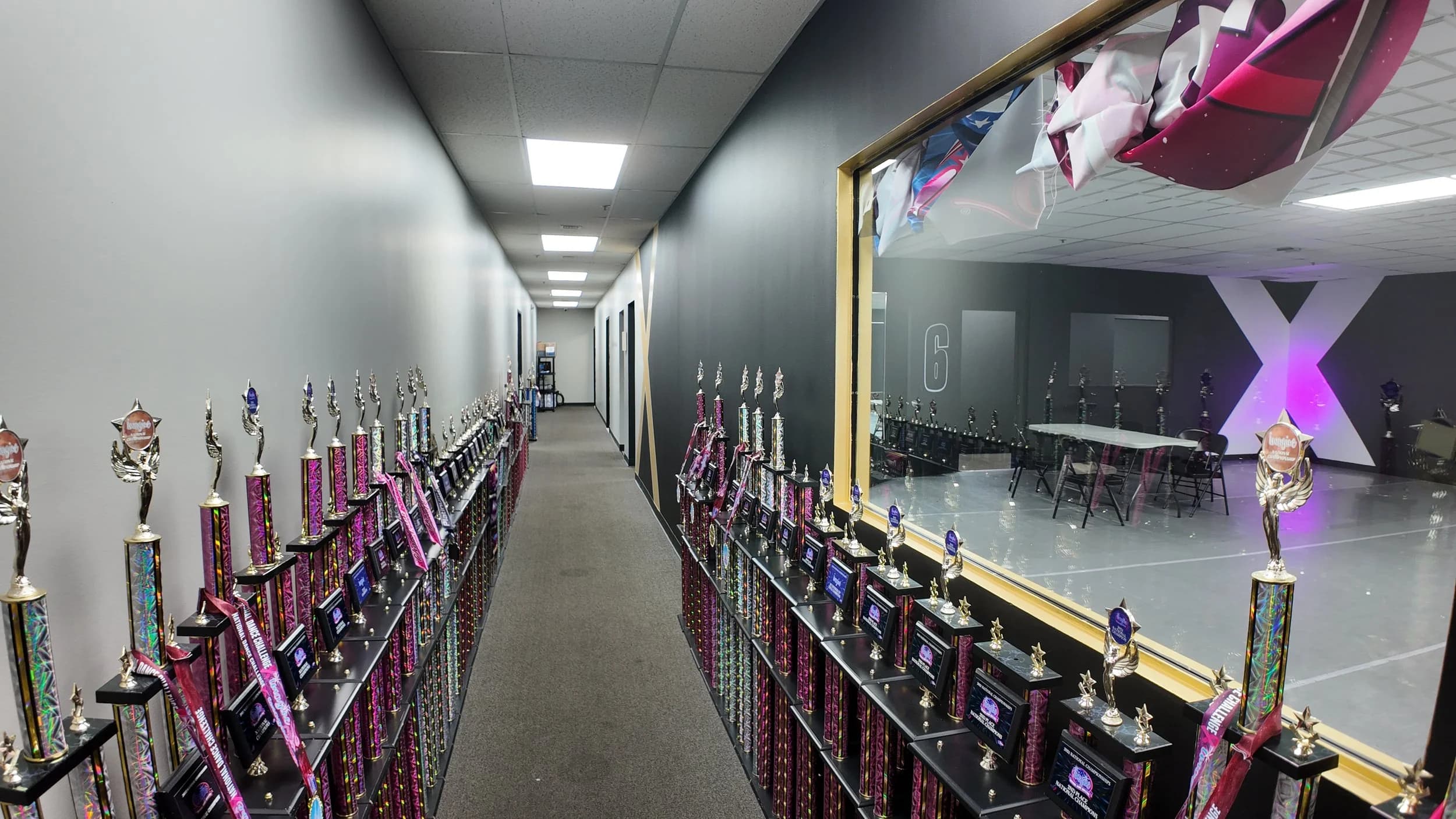 DXNY trophy display and studio window